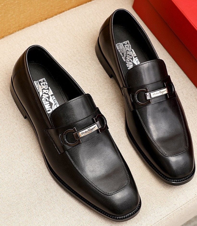Ferragamo Black Buckle Loafers — hero