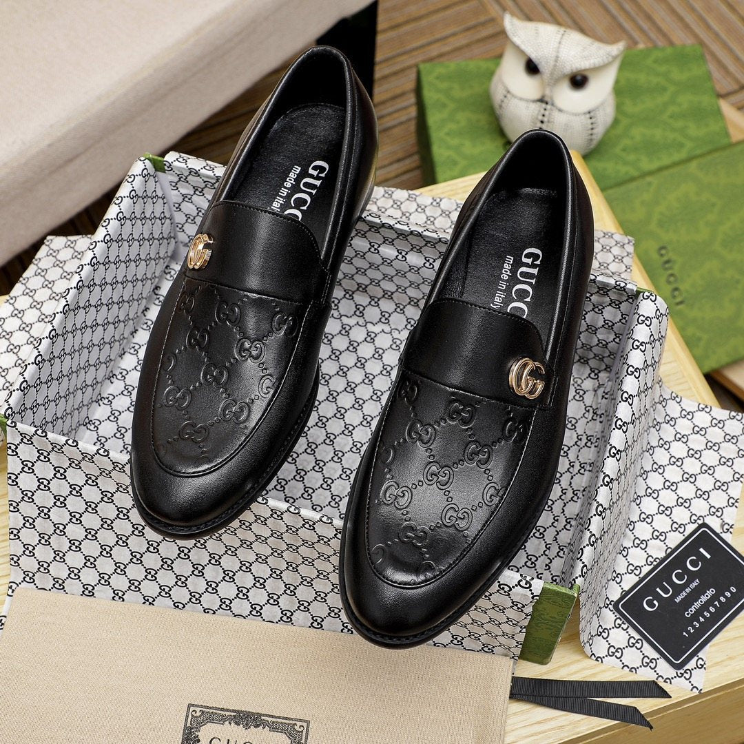 Gucci Black Embossed Hardware Loafers — hero
