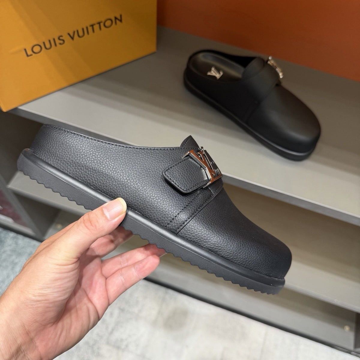 Louis Vuitton Textured Buckle Slide Sandals — front