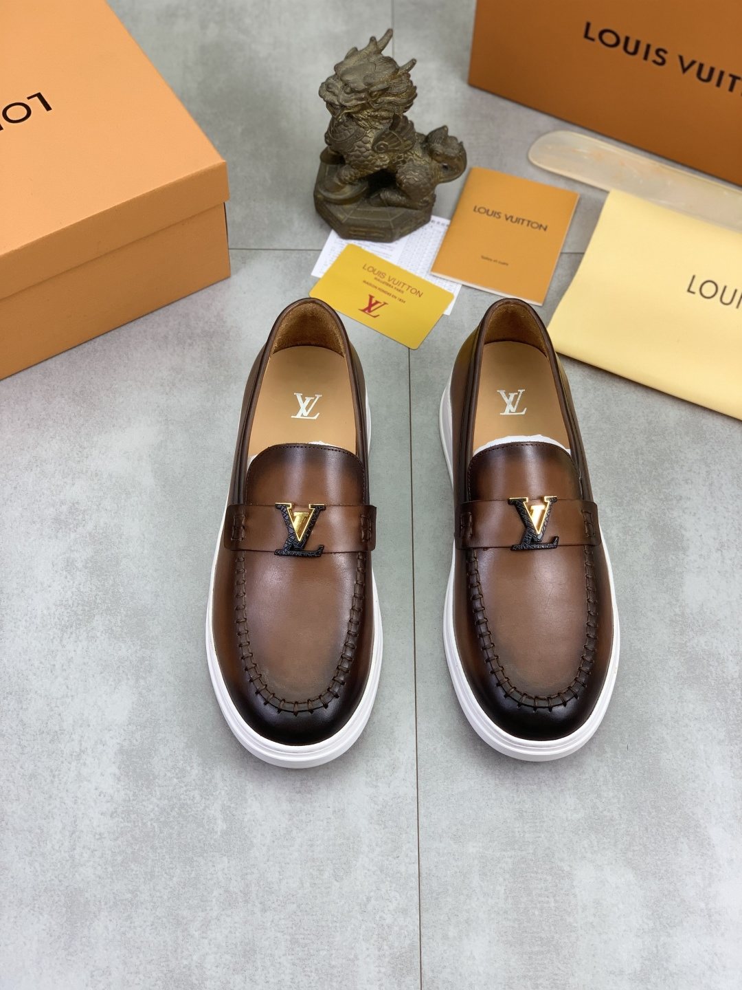 Louis Vuitton Metal Emblem Slip-On Loafers — front