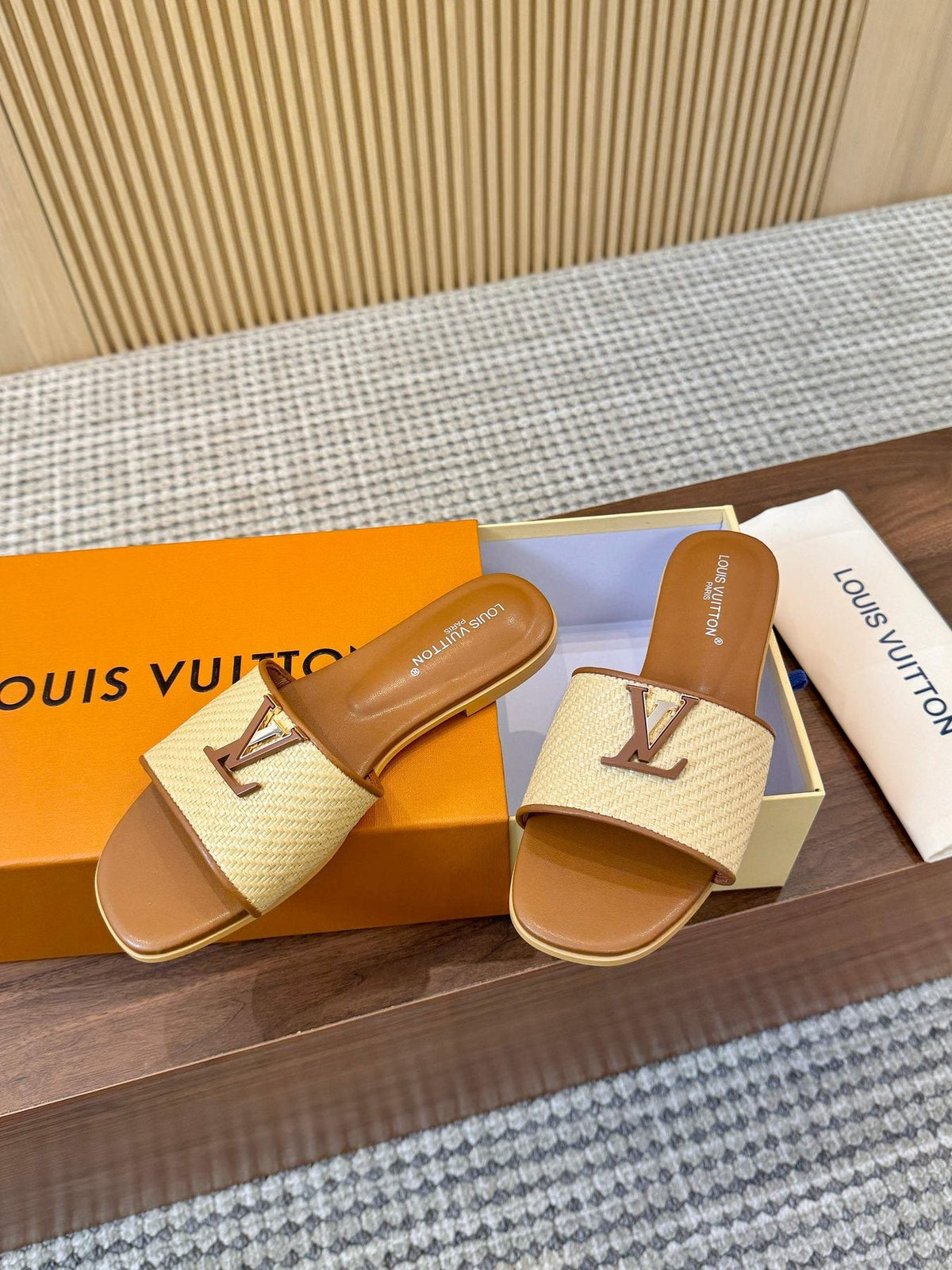 Louis Vuitton Textured Logo Slide Sandals — front