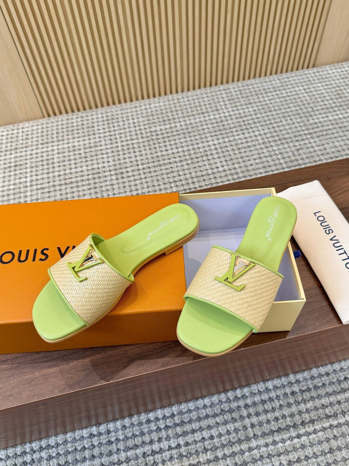 Louis Vuitton Textured Logo Slide Sandals — hero