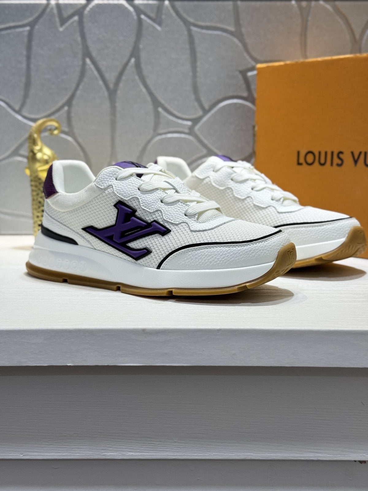 Louis Vuitton Low-Top Logo Sneakers — front