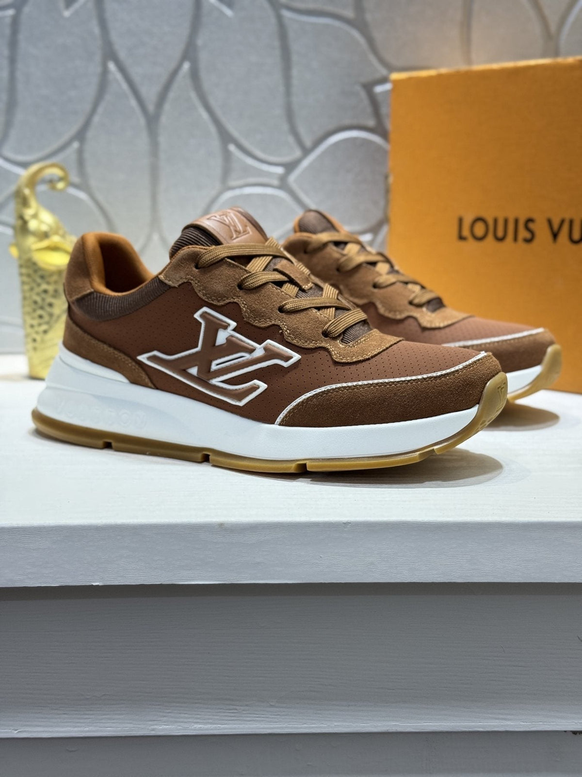 Louis Vuitton Low-Top Logo Sneakers — front