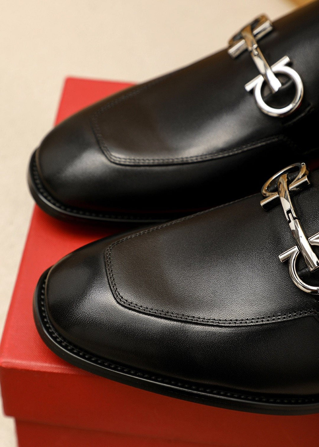 Ferragamo Silver-Tone Ornament Loafers — detail