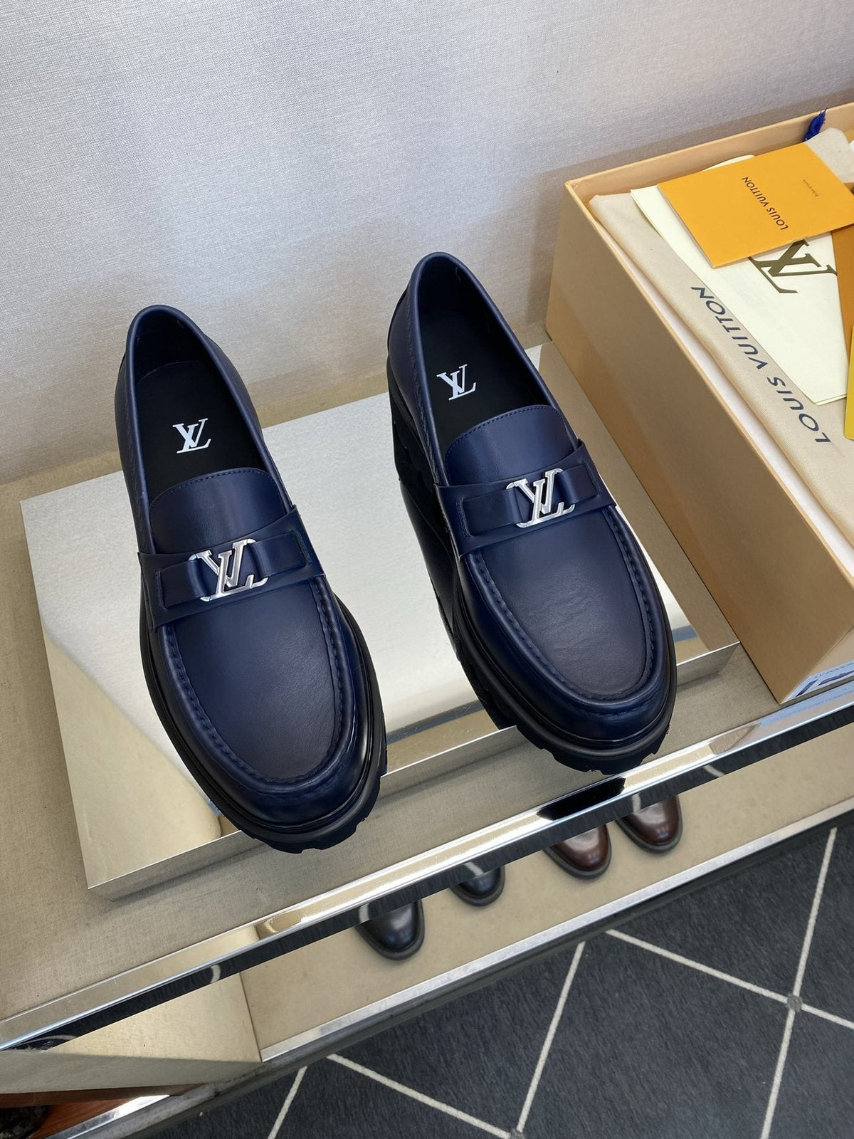 Louis Vuitton Metal Logo Loafers — front