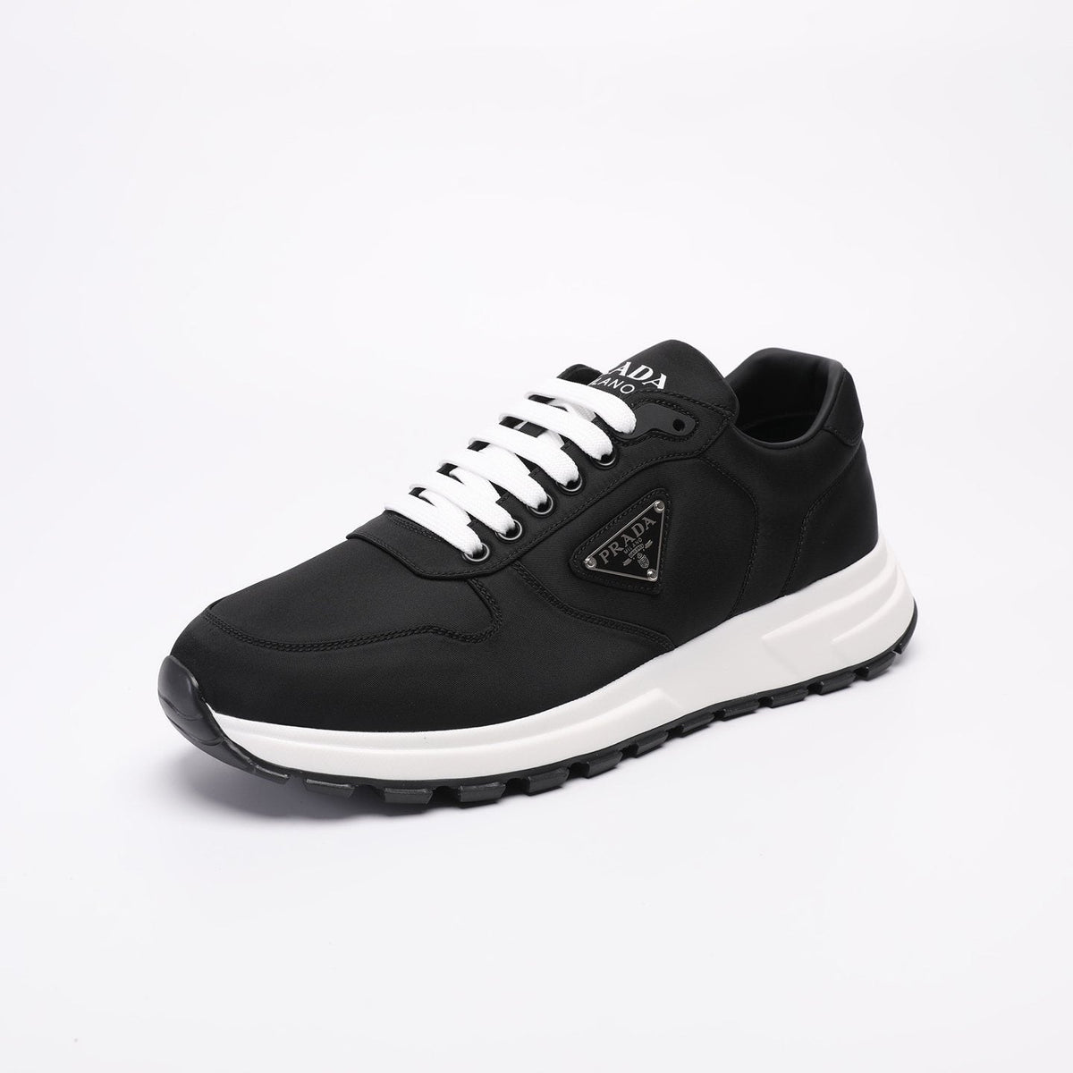 PRADA Navy Triangle Badge Sneakers — front