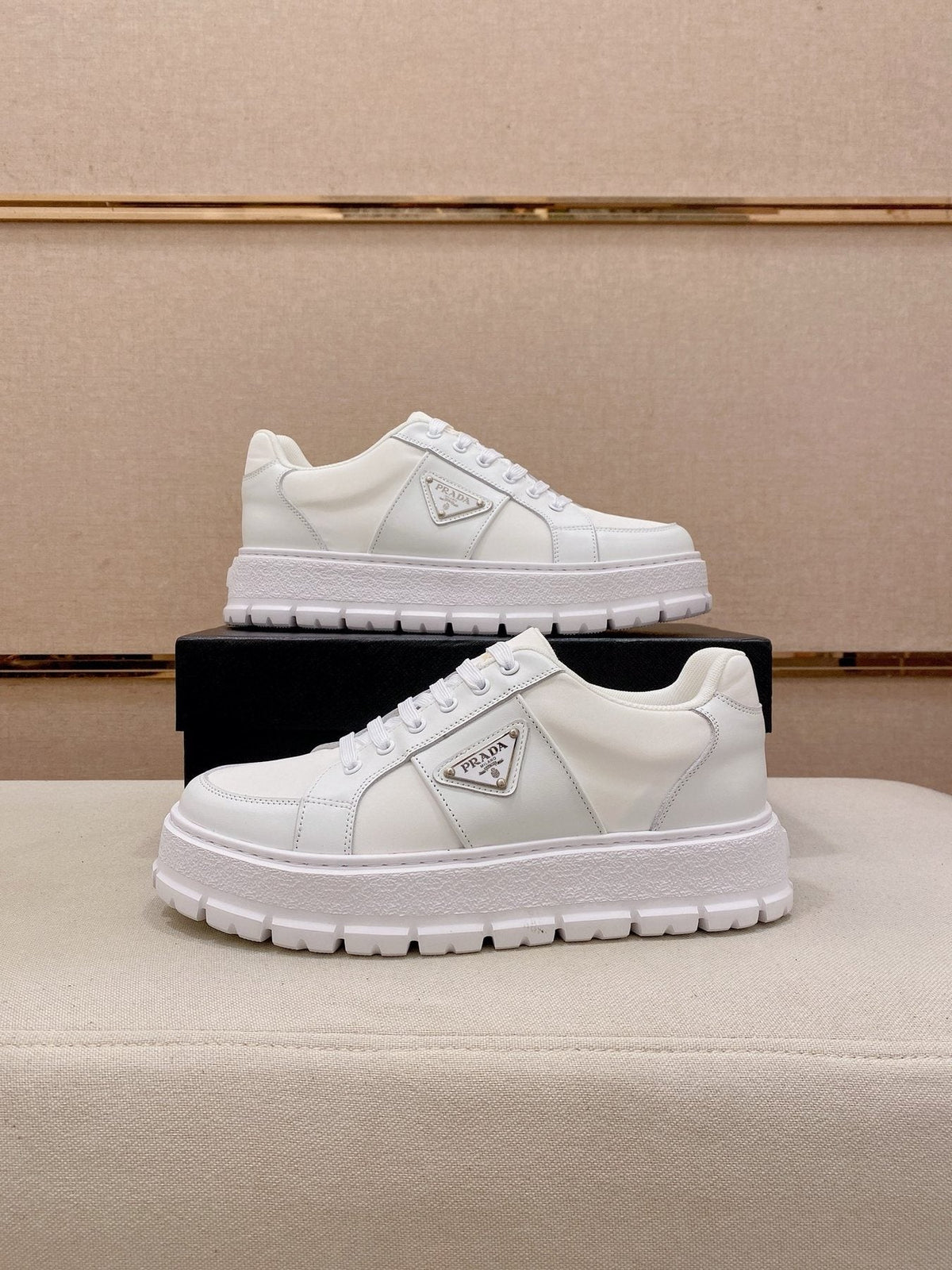 Prada Triangle Plaque Low-Top Sneakers — front