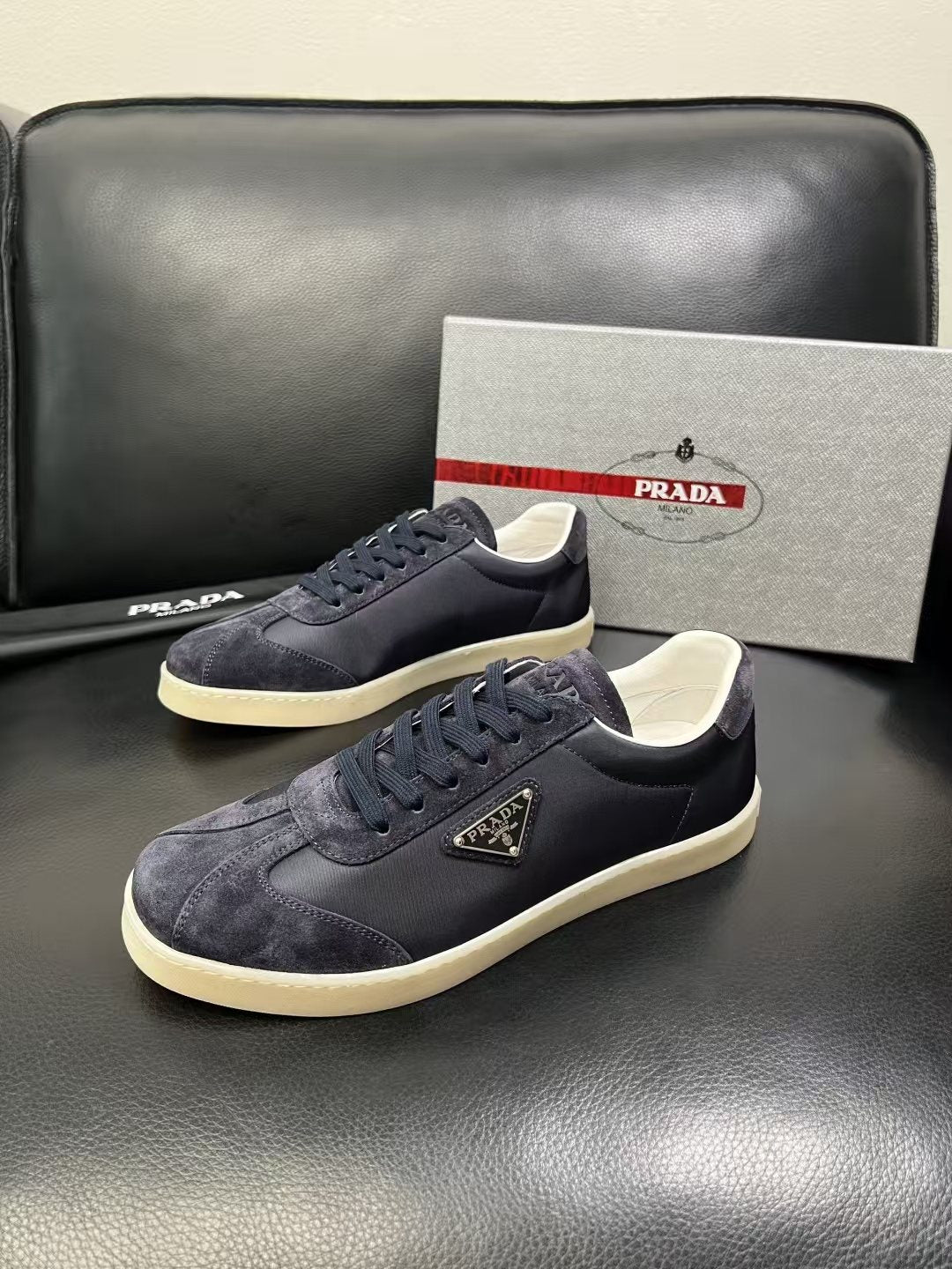 Prada Triangle Logo Low-Top Sneakers — front