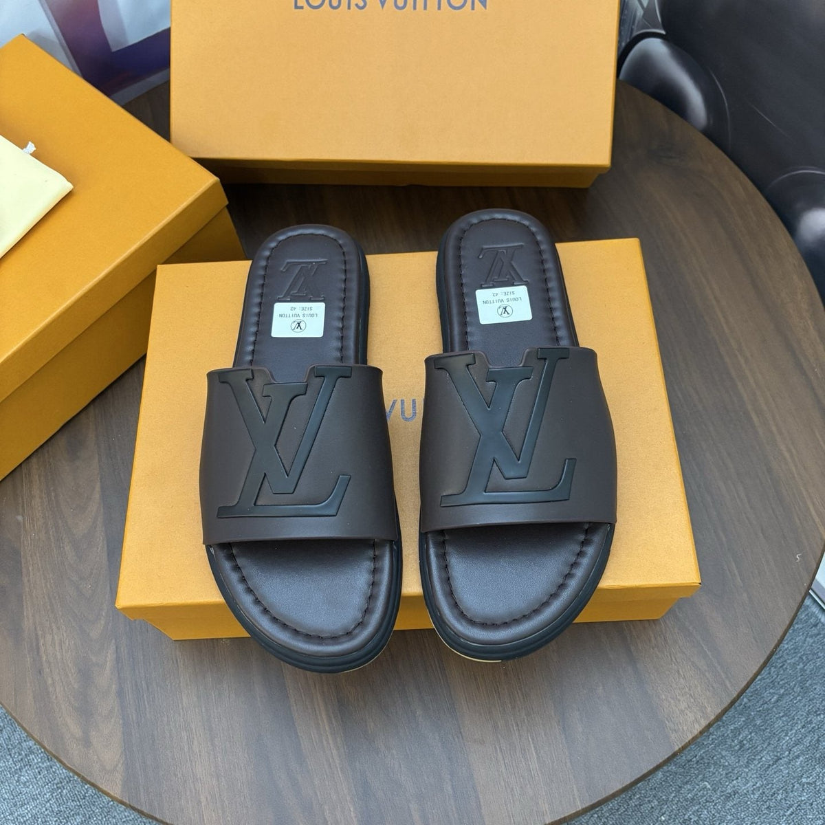 Louis Vuitton Raised-Monogram Slide Sandals — front