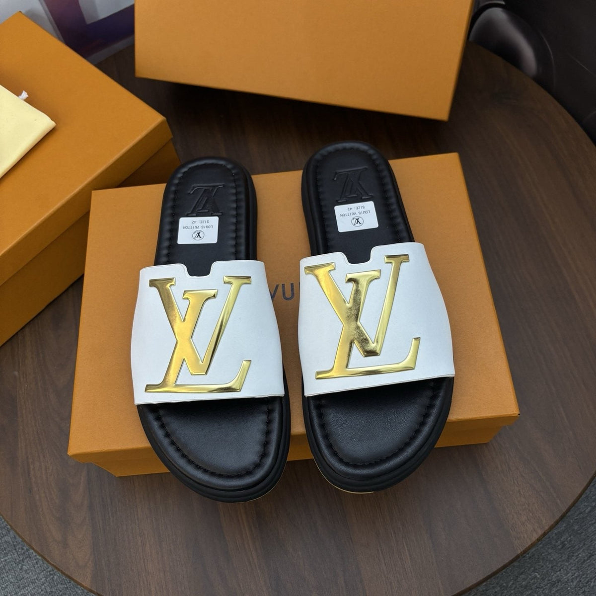 Louis Vuitton Raised-Monogram Slide Sandals — front
