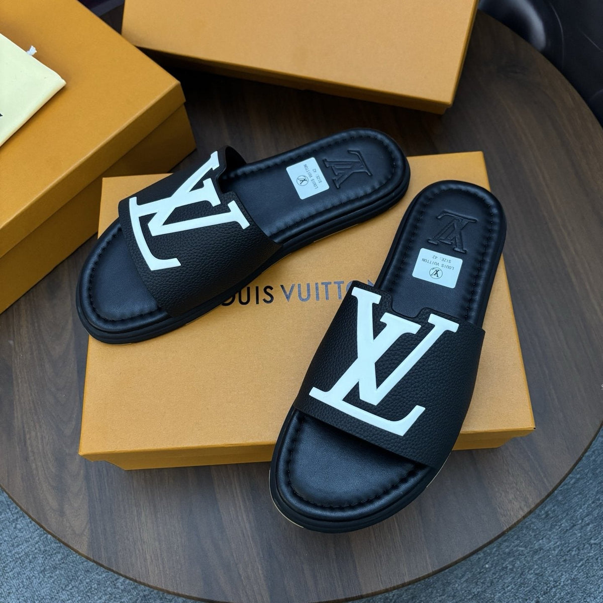 Louis Vuitton Raised-Monogram Slide Sandals — front