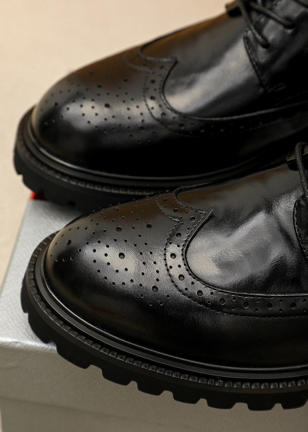 Prada Brogue Lug-Sole Derby Shoes — detail