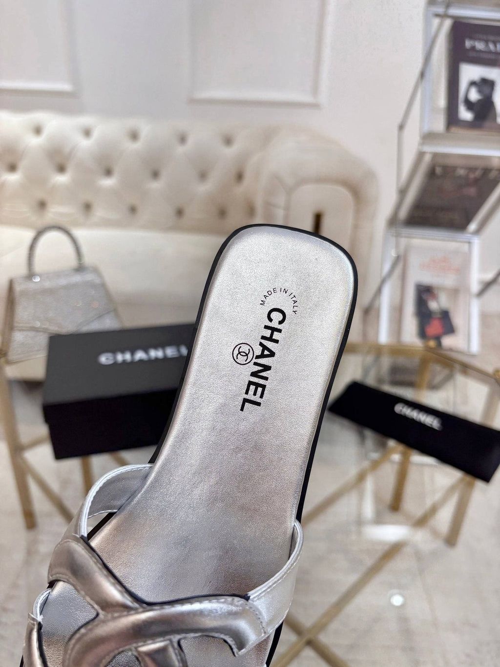 Chanel Embossed Logo Slide Sandals — side