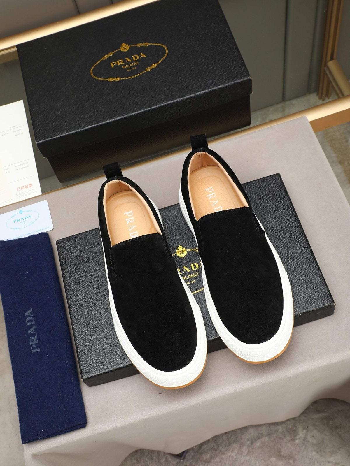 Prada Leather Slip-On Sneakers — front