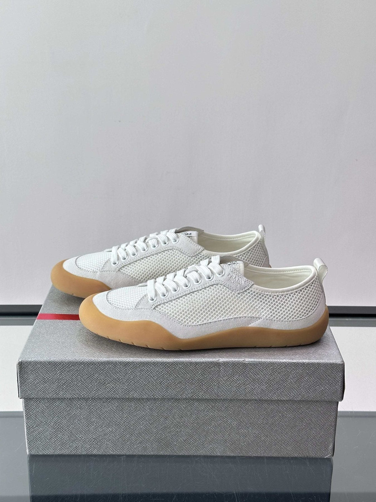 Prada Low-Top Perforated Sneakers — front