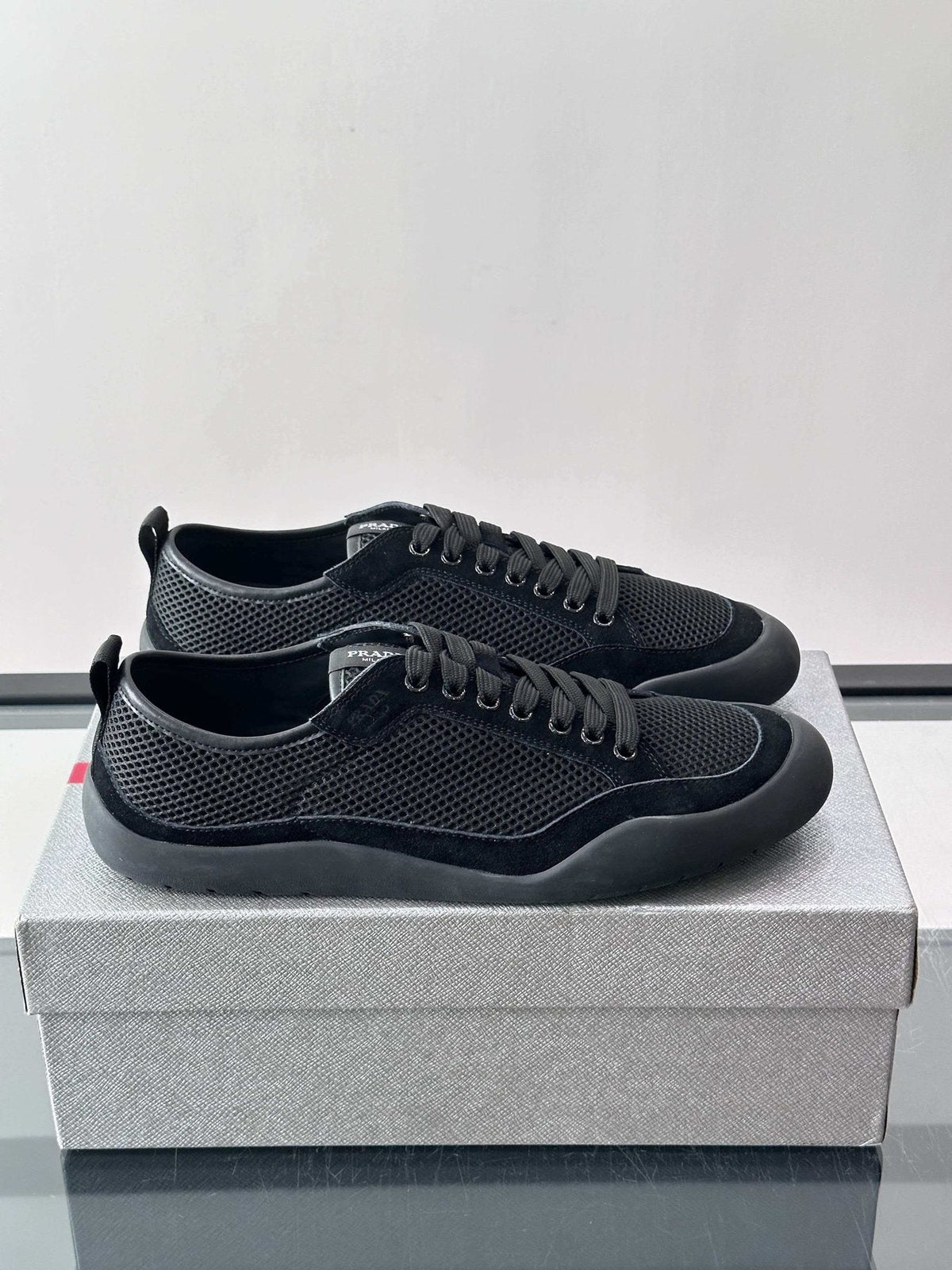 Prada Low-Top Perforated Sneakers — front