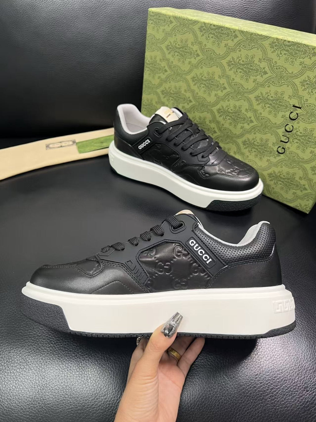 Gucci Embossed Low-Top Sneakers — side