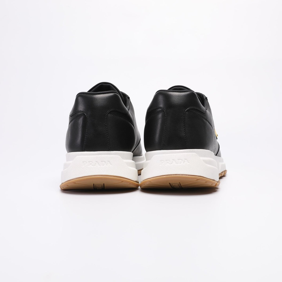 Prada Triangle Badge Low-Top Sneakers — front