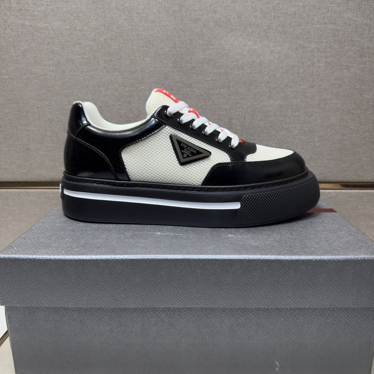 Prada Contrast Panel Low-Top Sneakers — hero