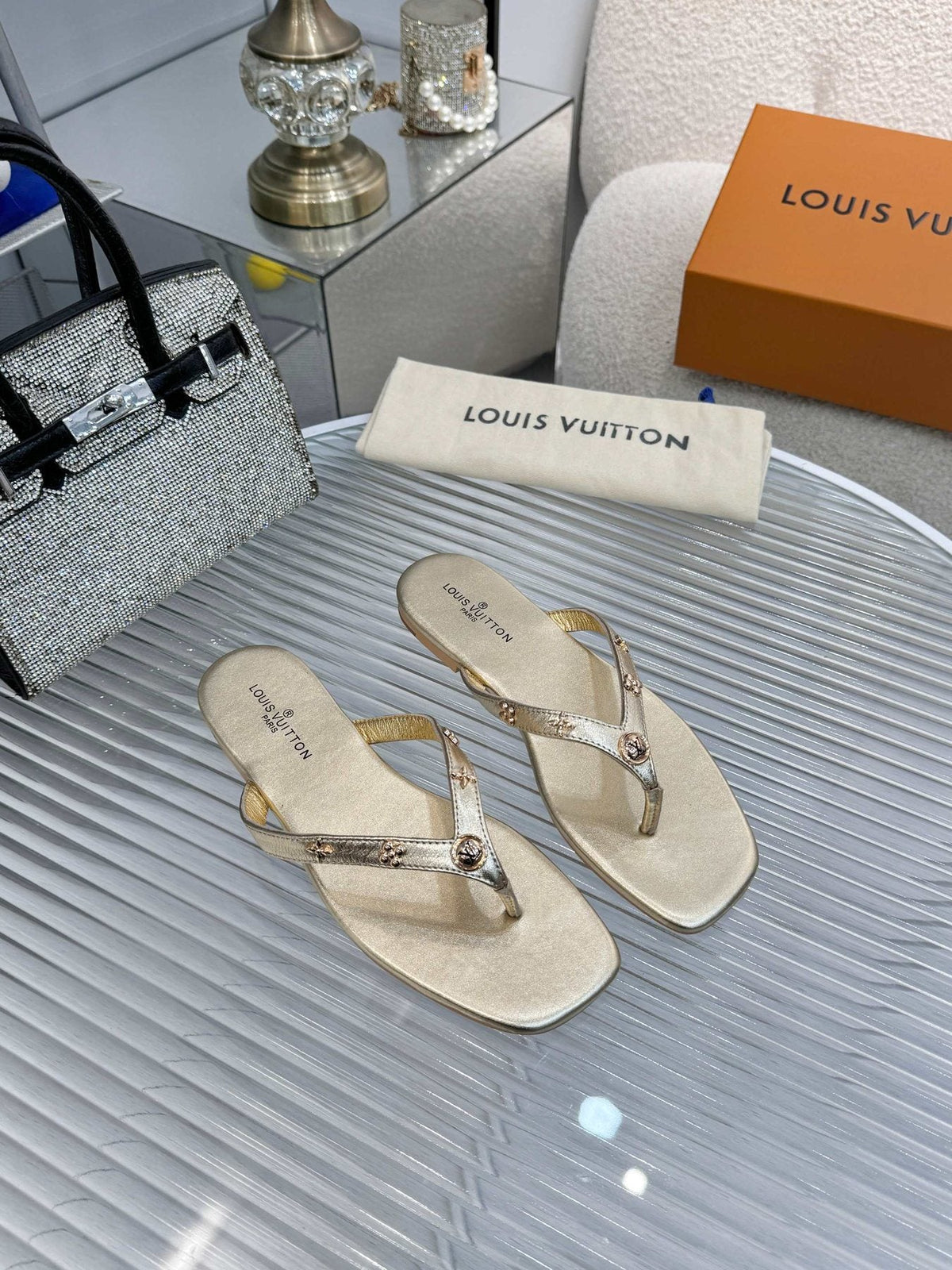 Louis Vuitton Metal-Detail Thong Sandals — front