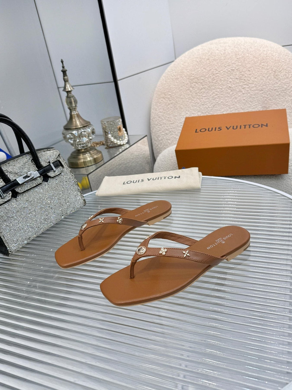 Louis Vuitton Metal-Detail Thong Sandals — front