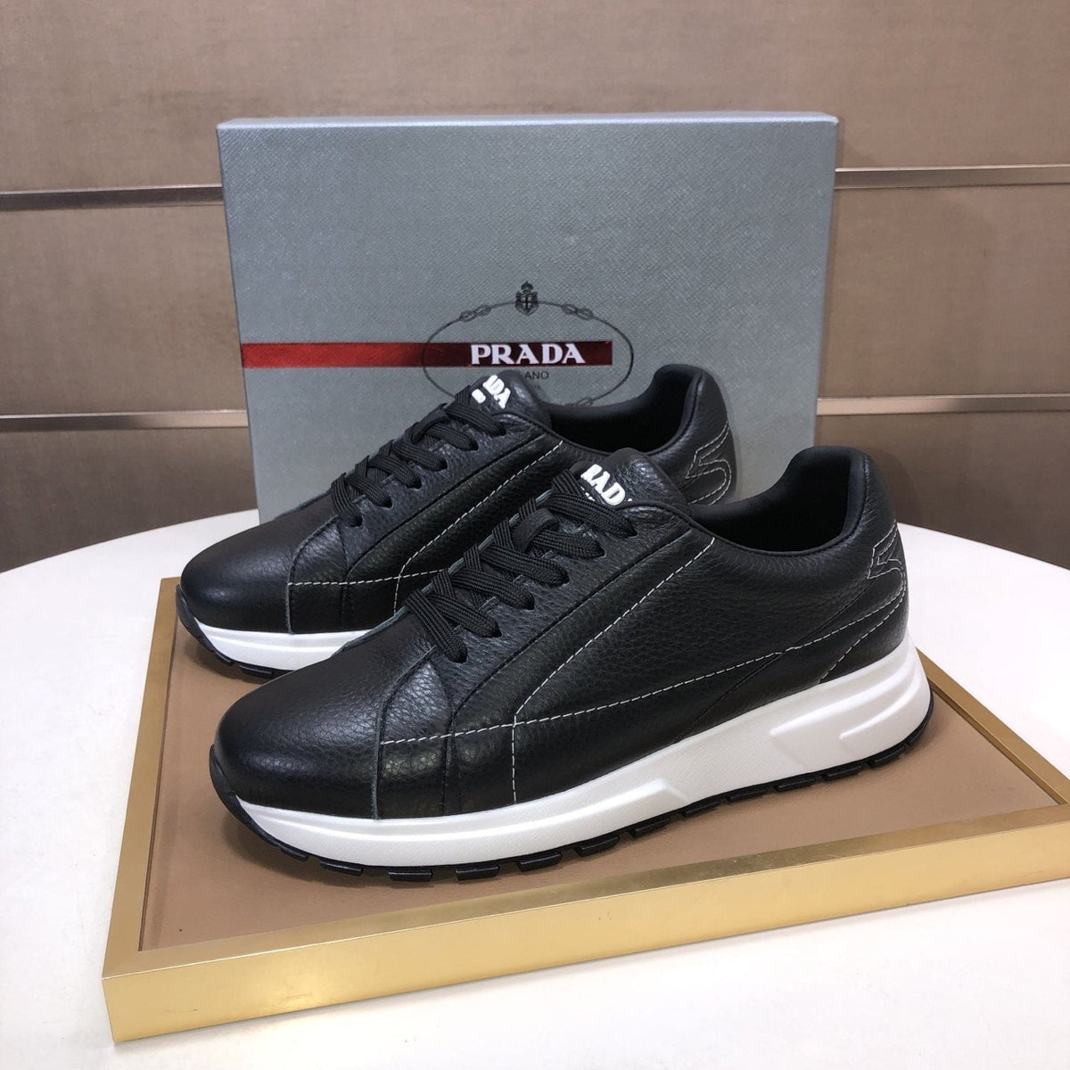 PRADA Black Quilted Low-Top Sneakers — hero