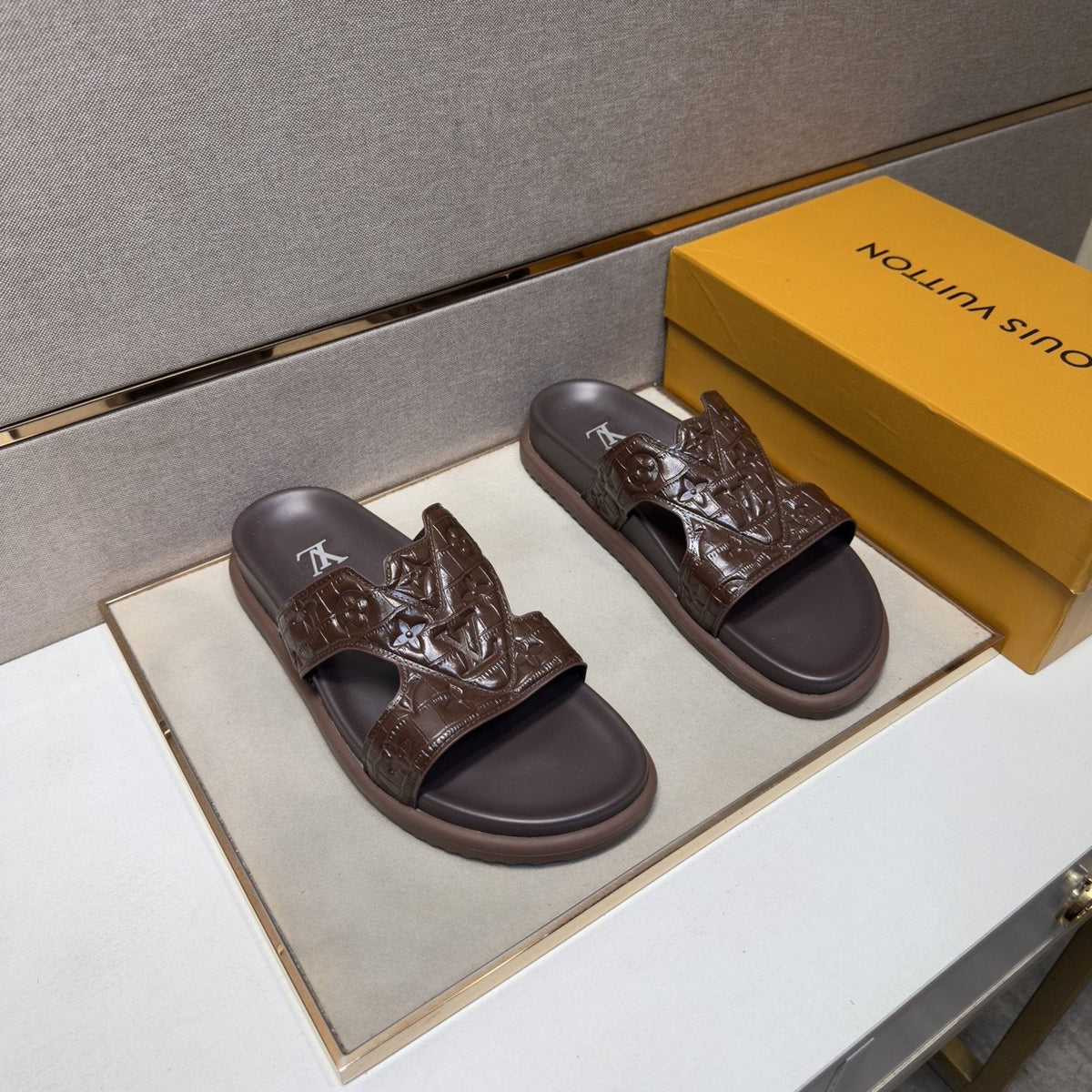 Louis Vuitton Textured Monogram Slide Sandals — front